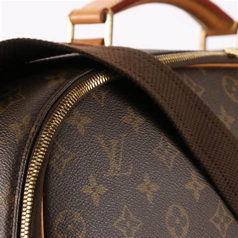 Louis Vuitton Monogram Packall PM .